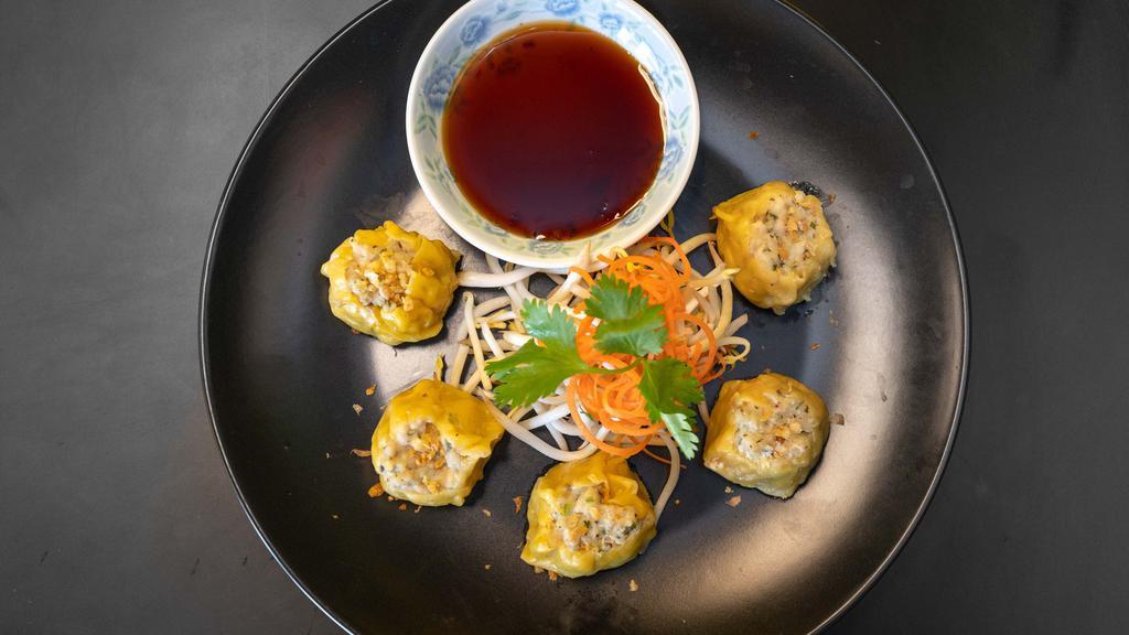 Steamed Ck Dumpling · Steamed dumplings, made with a mix of shrimp and chicken and served with black plum soy sauce.