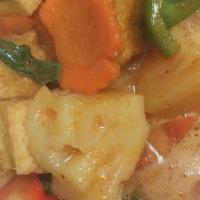 Pineapple Curry · Red curry with pineapple chunks, bell peppers, tomatoes and coconut milk. No spicy' will sti...