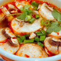 Tom Yum Vegetable · Gluten free. Spicy hot and sour soup with mushrooms, onions, tomatoes, lemongrass, lime juic...