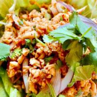 Larb Salad · Gluten free. Minced chicken or beef cooked with fresh lime juice, mixed with scallion, onion...
