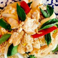 Basil Fried Rice · Steamed rice stir-fried with bell pepper, eggs, onions, and thai sweet basil.