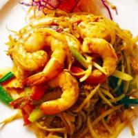 Curry Noodle · Gluten-free. Thin rice noodles sautéed with, eggs, bean sprouts, and green onions in red cur...