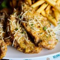 Jumbo Chicken Strips (4) · We mean jumbo! Dunked in our pub beer batter, fried till golden, and tossed in your choice o...