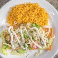 Flautas Plate · 3 flautas, chicken or shredded  beef, rice, beans and salad.