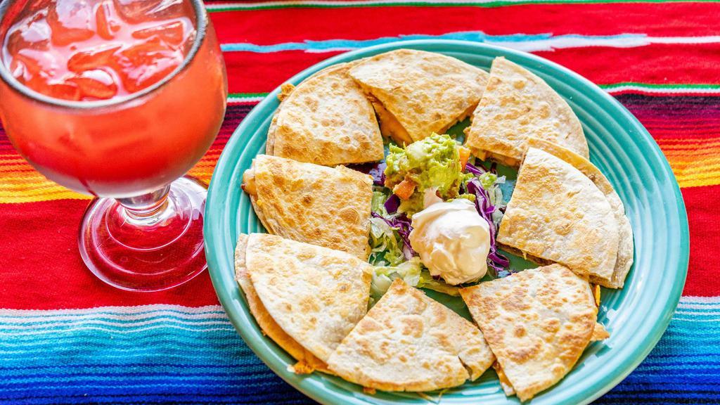 Cheese Quesadillas · Grilled flour tortillas stuffed with cheese. Served with guacamole and sour cream.