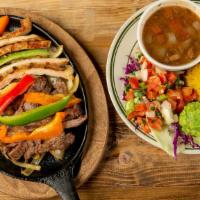 Beef Or Combo Fajita For 1 · Served with rice and charro beans, grilled onions, guacamole, flour tortillas and pico de ga...