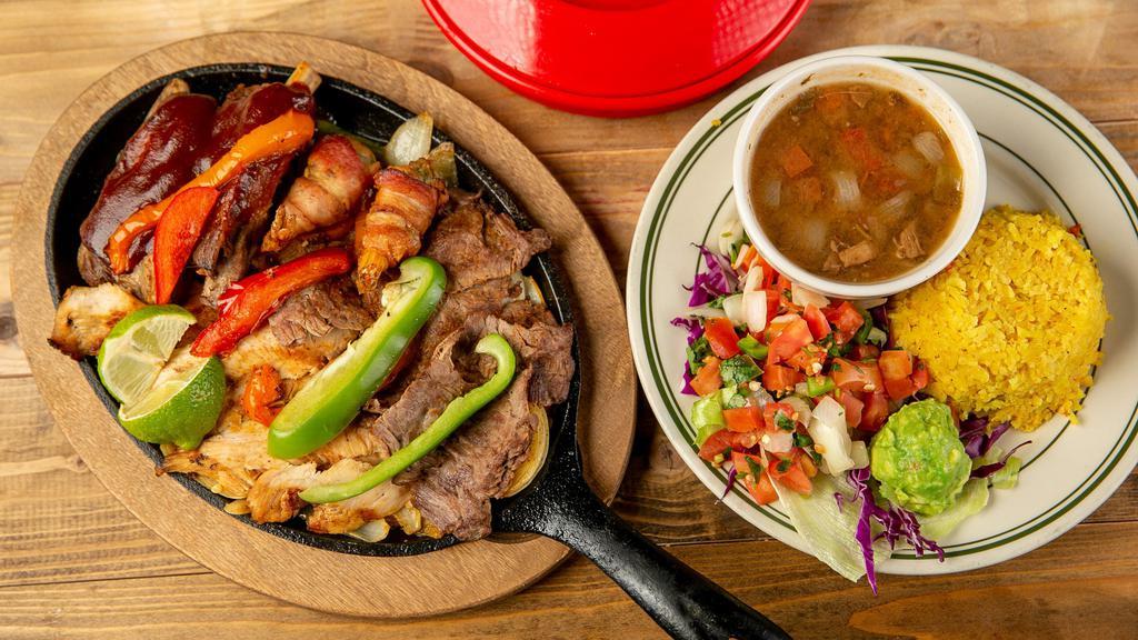 Fajita Poblana Beef Or  Combo  · Beef, chicken or combination fajitas topped with mushrooms, poblano peppers and jack cheese. Served with rice and charro beans.