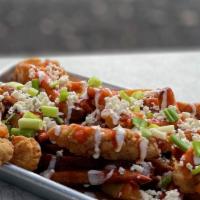 Buffalo Chicken Fries · Hand cut Fries topped with Fried Chicken, Buffalo Sauce, Ranch Dressing, Blue Cheese Crumble...