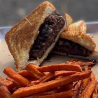 The Y.O. (Texas Patty Melt) · Classic Burger on Texas Toast with Swiss cheese, Sautéed Mushrooms & Onions