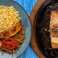 Norwegian Salmon · herbed lemon-butter | Spanish capers | rice pilaf | roasted potatoes | green beans