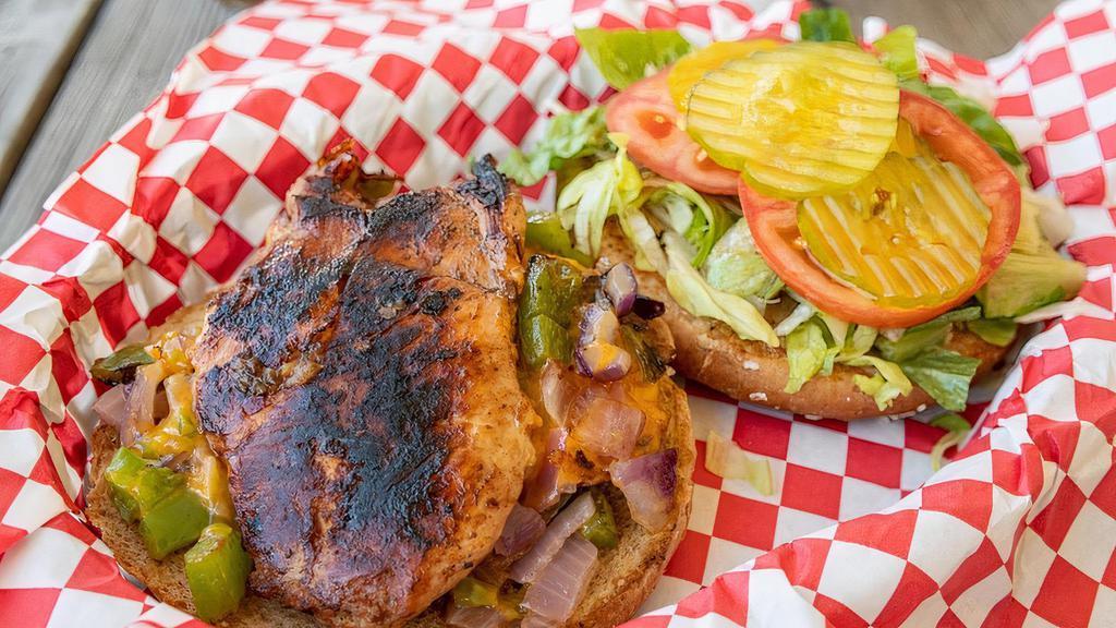 Marinated Yard Bird · Juicy marinated, bonless-skinless chicken breast, grilled and served on a whole wheat, buttered bun. 
