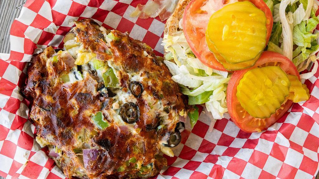 Veggie Burger · We take all of our fresh veggies, saute them on the grill and mix in a little provolone cheese and serve it on a whole wheat bun