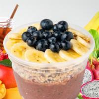 Divine Glow · Organic pitaya, mango, spinach, strawberries, honey, banana, 100% apple juice. Toppings: hem...