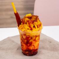 Chamango · Mango with chile ice cream, chunks of mango, tajin, chamoy, tamarindo candy straw.