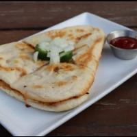 65 Quesadilla Veggy · mozzarella cheese and chickpeas with our house made 65 sauce.