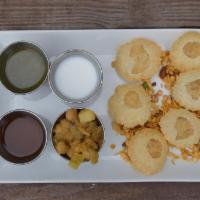 Mumbai Pani Puri · Classic Indian street fare served with curried chickpeas and chutneys, vegan w / o yogurt