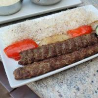 Beef Seekh Kabob · Hand crafted marinated beef cooked over a fire grill on a seekh. One of the most amazing see...