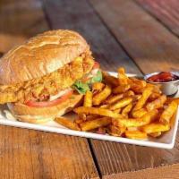 Fried Chicken Sandwich · Hand battered chicken breast with lettuce, tomato, onions