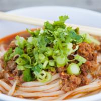 Dan Dan · Ground pork spiked with an abundance of garlic, ginger and scallions. Sweet, savory and spic...