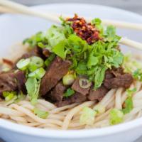 Cold Beef Vinaigrette Noodle · Served with a zesty garlic vinaigrette! Our fresh, springy noodles are glowing with slow-bra...