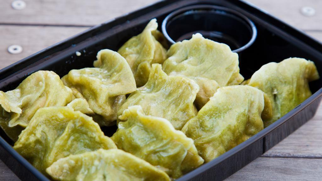 Edamame Dumplings · Vegan. Savory, decadent and not to be missed! Filled with a light yet substantial mixture of tender green edamame, puffy fried tofu, and savory tomatoes, these dumplings ensure that vegetarians are never an afterthought at MKNC. 10 count.