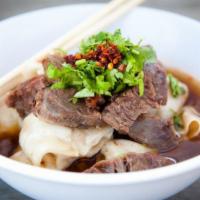 Beef Wonton Soup · So soul satisfying! A full order of 10 fresh wontons submerged in beef broth, with a generou...