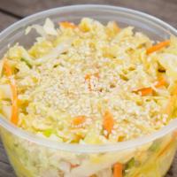 Asian Summer Slaw · Vegan. Julienned napa and carrots, wok toasted sesame seeds, and zingy sesame-giner vinaigre...