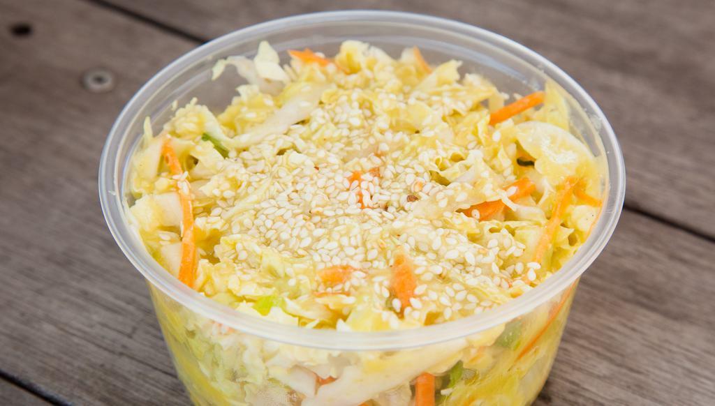 Asian Summer Slaw · Vegan. Julienned napa and carrots, wok toasted sesame seeds, and zingy sesame-giner vinaigrette. Come grab one today!