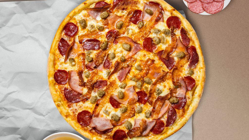 Mighty Meaty Lover Pizza · Mozzarella, pepperoni, chicken, and sausage baked on a hand-tossed dough