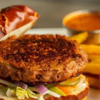 Beyond Meat Veggie Protein Burger · Beyond meat burger, lettuce, tomatoes, sautéed onions, bread and butter pickles, and vegan m...