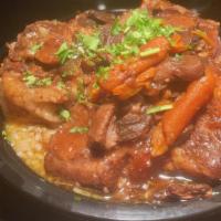 Momma'S Favorite: Stewed Oxtails · Momma's Favorite: Stewed Oxtails slow-cooked fork tendered southern stewed oxtails with carr...
