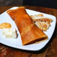 The Chicken Crepe · Includes chicken fajita, cheese, chipotle syrup, vegetables.