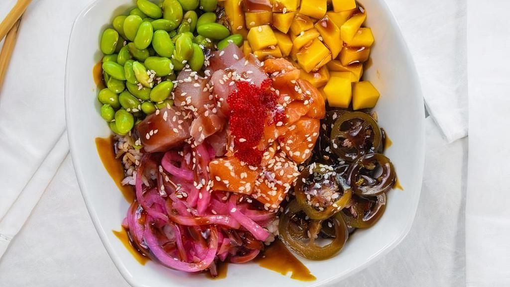 Big Kahuna Bowl · Salmon, tuna, pickled onion, masago, mango, edamame pods, pickled jalapeño, eel sauce, ponzu sauce and white sesame seeds.