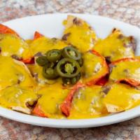 Full Order Bean & Cheese Nachos · Bean and cheese nachos topped with jalapeños. 12 nachos come in a full order.