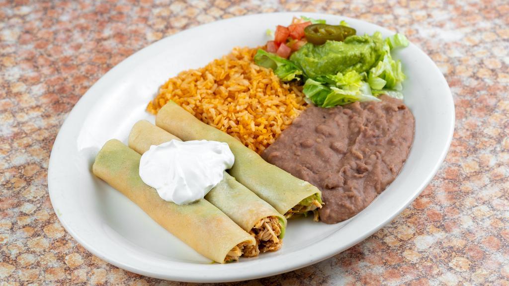 Tacos A La Diana · Three soft rolled tacos filled with guacamole and shredded chicken. Garnished with sour cream and served with Spanish rice, refried beans, and guacamole salad.

*Entrée comes with 1 tortilla.