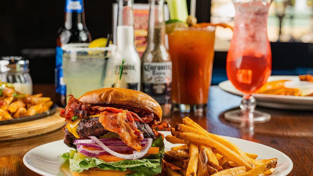 The Blt Burger · Half-Pounder, with American Cheese, Tomato, Onions, Pickles, Romaine Lettuce, Bacon & Chipotle Mayo.