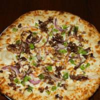 Philly Cheesesteak · Thinly Sliced Sirloin, Grilled Peppers & Onions, Mozzarella & White Alfredo Sauce.