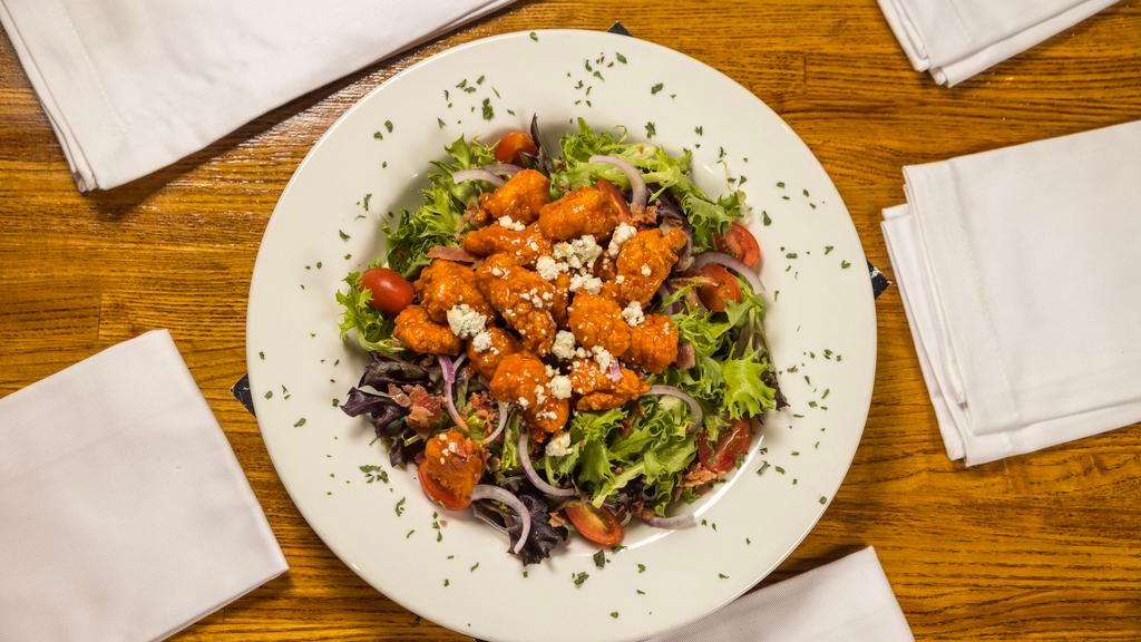 Buffalo Chicken Salad · Chicken, Mixed Greens, Red Onions, Bacon, Tomato & Blue Cheese Crumbles. Chicken available Fried or Grilled Mild, Hot & Diablo.