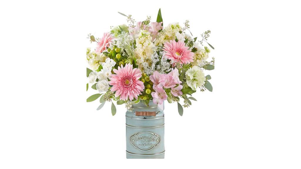 Charming Blush Bouquet · All-around arrangement with pink Gerbera daisies and Peruvian lilies (alstroemeria), lime green carnations, white mini carnations, Queen Anne’s Lace and cream stock; accented with green hypericum and assorted greenery.