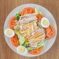 Chef Salad · With ham, turkey, swiss and cheddar cheeses, tomatoes and hard boiled egg and choice of dres...