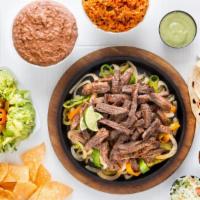 Parr -4 Beef Fajitas · Includes rice, refried beans, guacamole and tortillas.
