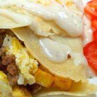 Country Crepe · Sausage eggs, diced potatoes, country gravy.