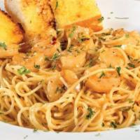 Pasta Lafitte · Fire roasted tomatoes in a creamy Cajun sauce and tossed in Angel Hair pasta. Served with ho...
