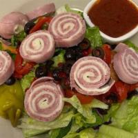 Chef'S Salad · Tossed salad with pimentos, black olives, and pinwheels of  ham, mozzarella, and provolone c...
