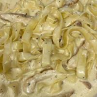 Chicken Fettuccine Alfredo · The classic noodle with a cream based sauce.