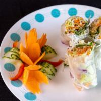 Аз. Fresh Spring Rolls (2) · Fresh mixed vegetables and herbs wrapped in rice paper served with peanut sauce and sour sau...