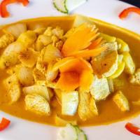 Yellow Curry · Cooked with onions and potatoes.