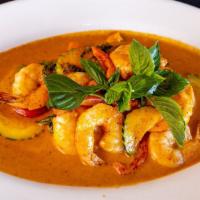Panang Curry · Cooked with zucchini, bell peppers, and basil leaves.