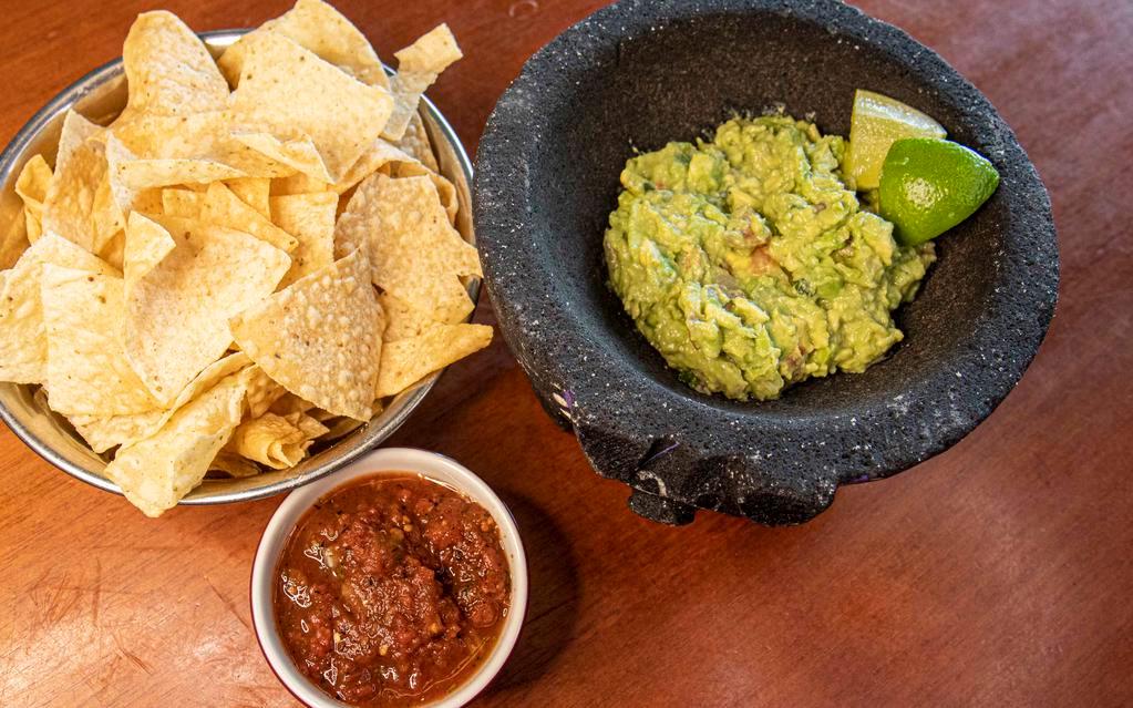 Guacamole & Chips · Fresh made 1/2 pint  of mild  guacamole, and 1 bag of  chips ( salsa not included) ( Tableside available Dine in only)
