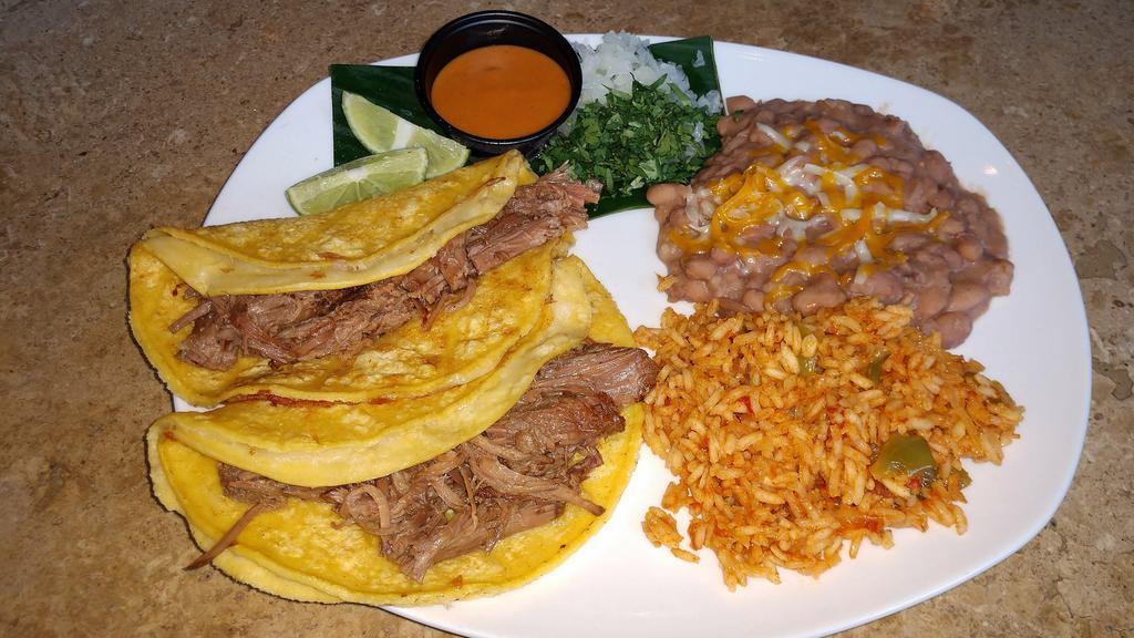 Brisket Tacos · House roasted brisket , corn tortillas, white cheese, street salsa (arbol) and toppings. Choice of one side * If selecting Mango Salad  - type in your dressing choice * 
Mango Champagne Vinaigrette
Guacamole Ranch
Vinegar & Olive oil
Ranch